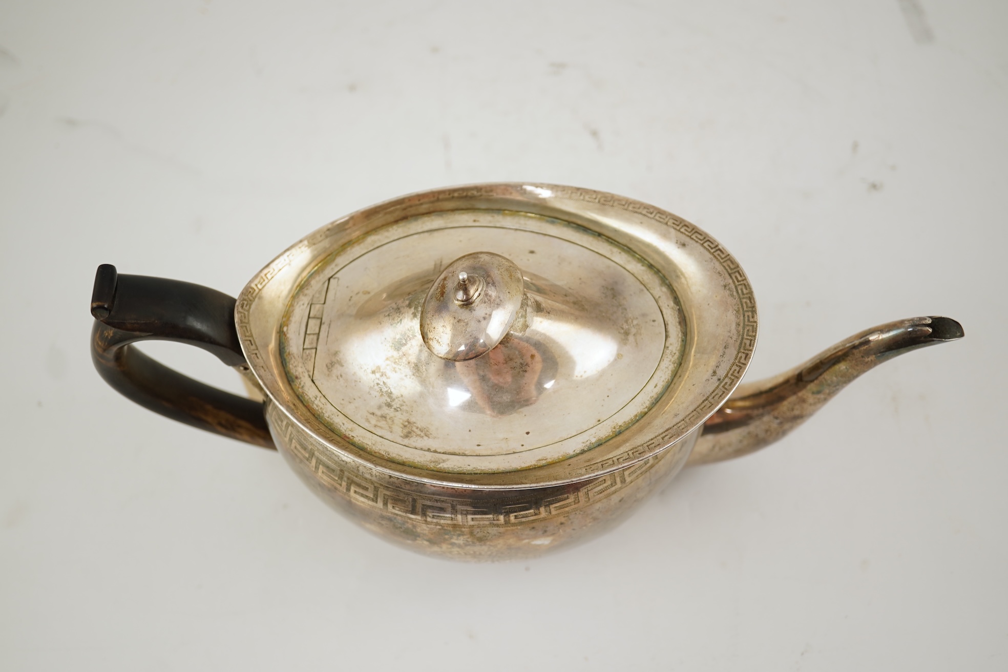 A George III silver oval teapot and matching oval stand, by John Eames